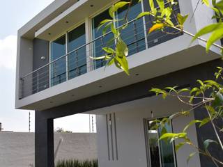 Casa Los Cerezos, arketipo-taller de arquitectura arketipo-taller de arquitectura Moderne Häuser