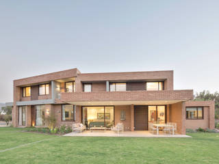 Casa Condominio Altos de Chicureo, Grupo E Arquitectura y construcción Grupo E Arquitectura y construcción Nowoczesne domy