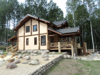 Бревечатый каркасный дом, Техно-сруб Техно-сруб Casas de estilo rural Madera Acabado en madera