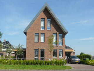Woning Waterrijk Woerden, Architectenbureau van den Hoeven b.v. Architectenbureau van den Hoeven b.v. Moderne huizen Steen