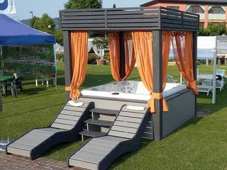 Arredare un giardino con una Jacuzzi , Aquazzura Piscine Aquazzura Piscine Modern style gardens