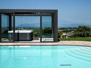 Come portare una spa con veranda in giardino ., Aquazzura Piscine Aquazzura Piscine Jardines de estilo moderno