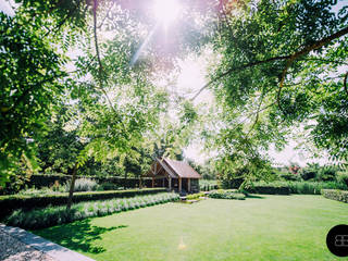 Landelijke villatuin met natuurlijke vijver, Buro Buitenom exterieurontwerpers Buro Buitenom exterieurontwerpers Сад