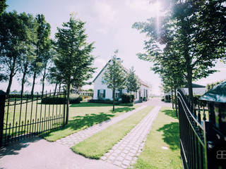 Landelijke tuin bij gerenoveerde boerderij, Buro Buitenom exterieurontwerpers Buro Buitenom exterieurontwerpers Jardin rural