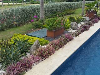 homify Jardins tropicais