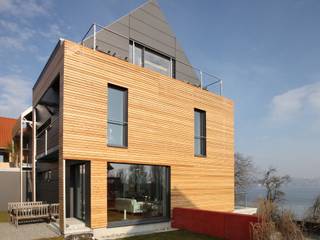 HAUS AM BODENSEE, ARCHITEKTEN GECKELER ARCHITEKTEN GECKELER Moderne Häuser Holz Schwarz