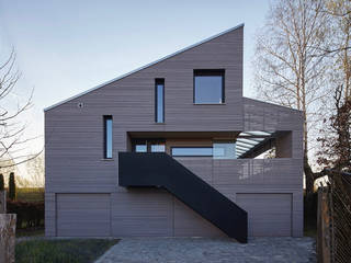 Ein Ferienhaus am Bodensee konzipiert von den Architeckten Geckeler, ARCHITEKTEN GECKELER ARCHITEKTEN GECKELER Casas modernas Madera Gris