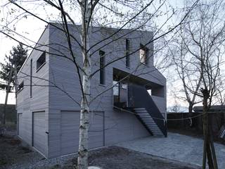Ein Ferienhaus am Bodensee konzipiert von den Architeckten Geckeler, ARCHITEKTEN GECKELER ARCHITEKTEN GECKELER Nhà Gỗ Grey