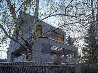 Ein Ferienhaus am Bodensee konzipiert von den Architeckten Geckeler, ARCHITEKTEN GECKELER ARCHITEKTEN GECKELER Casas modernas Madera Gris