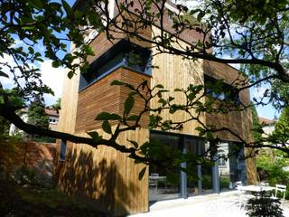 Construction d'une maison familiale moderne en bois, Archionline Archionline Rumah Modern