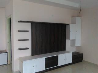 Interiors for 3 BHK apartment, BYOD Dezigns BYOD Dezigns ห้องนั่งเล่น แผ่นไม้อัด Plywood ชั้นวางทีวีและตู้วางทีวี