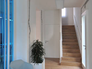 cna, tissellistudioarchitetti tissellistudioarchitetti industrial style corridor, hallway & stairs