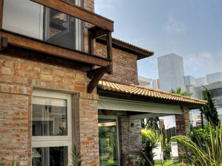 Casa Litoral, CABRAL Arquitetos CABRAL Arquitetos Casas de estilo tropical Ladrillos