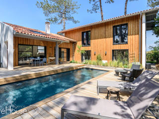 Création d’une maison individuelle avec piscine, Agence CréHouse Agence CréHouse Casas modernas