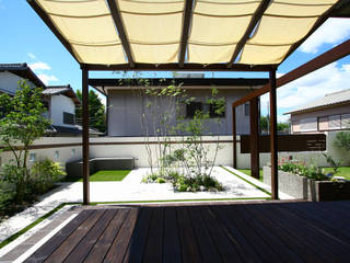 明るく優しいお庭に, 株式会社 岡本ガーデン 株式会社 岡本ガーデン Eclectic style garden Wood Wood effect