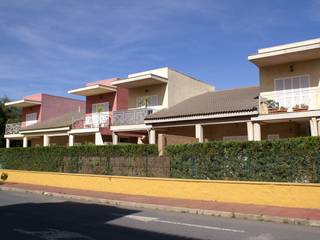 APARTAMENTOS TURÍSTICOS - ISLA CANELA, GILMARQUEZ ARQUITECTOS GILMARQUEZ ARQUITECTOS Modern houses