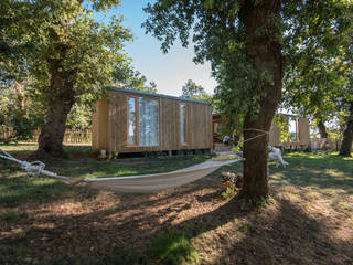 CASA MODULAR DE MADERA HÉCTOR & PURI, ADDOMO ADDOMO Casas de estilo escandinavo