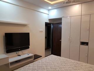 andheri west 2 bhk The Red Brick Wall BedroomWardrobes & closets White