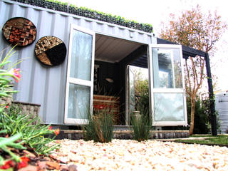 Roof garden on container home Acton Gardens Industrial style houses Metal insulation,container living,shipping container,roof garden,gabions,recycle