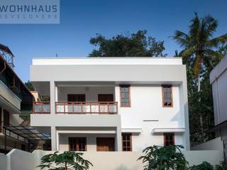 1400sqft House in Trivandrum, Wohnhaus Developers Wohnhaus Developers モダンな 家 レンガ