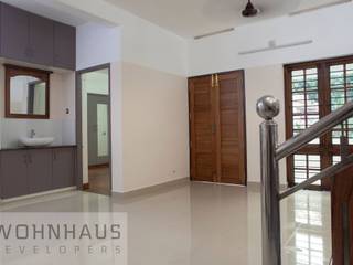 1400sqft House in Trivandrum, Wohnhaus Developers Wohnhaus Developers Pasillos, vestíbulos y escaleras modernos Cerámico