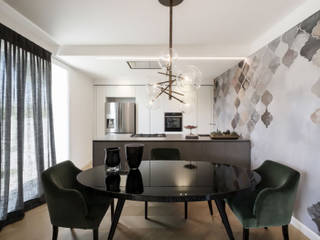 Un appartamento in cui vivere lo stile, Daniela Nori Daniela Nori Modern dining room