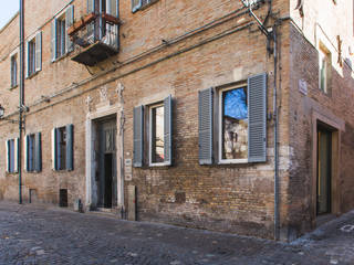 Atelier Palazzo Amiani, STUDIO ASSOCIATO ARCHITETTI FRANCOLINI STUDIO ASSOCIATO ARCHITETTI FRANCOLINI Casas unifamiliares