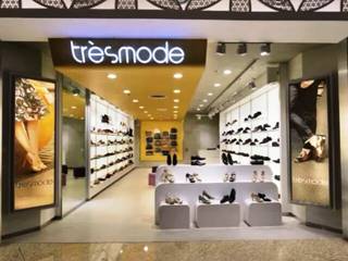 TRESMODE SHOWROOM, STELLE DESIGN PVT LTD STELLE DESIGN PVT LTD Paredes e pisos modernos