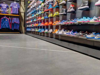 Suelos MICROTOPPING® - Tiendas Nike, Fermox Solutions Fermox Solutions Commercial spaces