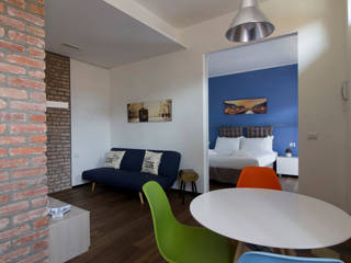 Ciaia Red&Blu (Milano) Low cost di qualità per due mini appartamenti destinati all'Airbnb, studiodonizelli studiodonizelli Ruang Keluarga Modern