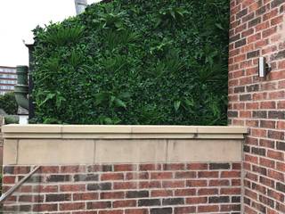 covering an ugly wall with artificial hedge for an instant vertical green wall look, Hedged In Ltd Hedged In Ltd