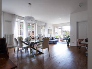 37VM_Ristrutturazione di un appartamento a Como, Chantal Forzatti architetto Chantal Forzatti architetto Sala da pranzo moderna Bianco