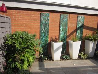 SMALL MODERN GARDEN DESIGN IN ESSEX, Earth Designs Earth Designs Jardines de estilo moderno