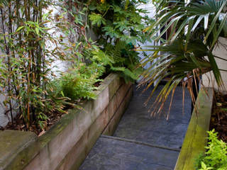 Outdoor Living Garden design in South London, Earth Designs Earth Designs Eclectic style garden