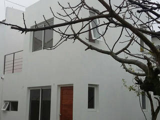 Duplex Minimalista, Dsg Arquitectura Dsg Arquitectura Casas de estilo minimalista Concreto