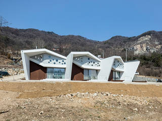 Interlaced Folding : Hotel Doban, HGA 건축디자인연구소 HGA 건축디자인연구소 Casas modernas: Ideas, imágenes y decoración Concreto reforzado