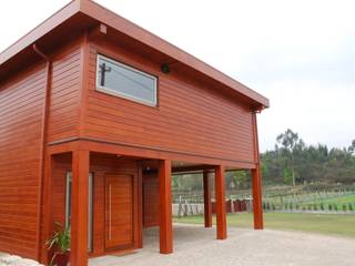 RUSTICASA | Casa unifamiliar | Paços de Ferreira, RUSTICASA RUSTICASA Chalés e casas de madeira Madeira Efeito de madeira