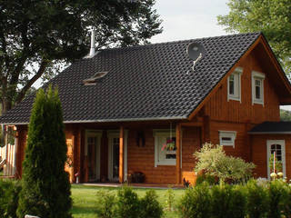 Einfamilien Blockhaus, Finnscania Blockhausfabrik Finnscania Blockhausfabrik Log cabin Wood Wood effect