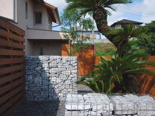 Casas ecléticas por 神谷建築スタジオ Eclético