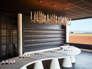 The designer Amaya Arzuaga “tailors” the Bodegas Arzuaga Navarro sampling table with KRION, KRION® Porcelanosa Solid Surface KRION® Porcelanosa Solid Surface Wine cellar