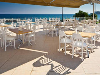 Kıbrıs Ada Beach Otel Dekorasyon, Palmiye Koçak Sandalye Masa Koltuk Mobilya Dekorasyon Palmiye Koçak Sandalye Masa Koltuk Mobilya Dekorasyon Jardin intérieur