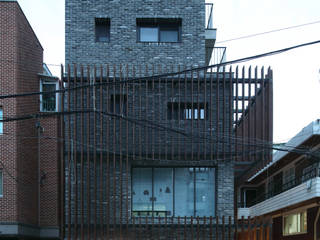 신당동 테라스하우스 율담, (주)건축사사무소 모도건축 (주)건축사사무소 모도건축 Modern houses Bricks