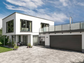 Moderne Flachdachvilla im Bauhausstil mit architektonischen Highlights, wir leben haus - Bauunternehmen in Bayern wir leben haus - Bauunternehmen in Bayern Einfamilienhaus