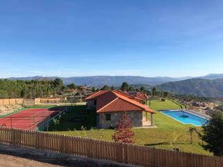 Aldeamento Bela Vista Village, Rustinor Rustinor Casas de estilo rústico Piedra