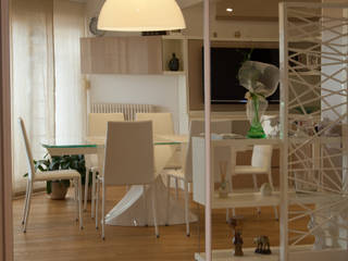 Attico a Cattolica ( RN ), Co-design studio Co-design studio Dining room