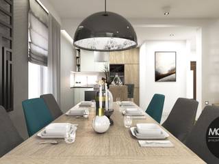 Nowoczesne wnętrze salonu i kuchni, MONOstudio MONOstudio Modern dining room