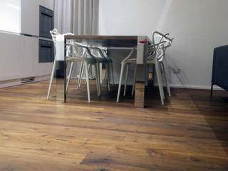 Appartamento Seregno, DELFINETTIDESIGN DELFINETTIDESIGN Dining room لکڑی Wood effect