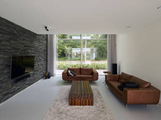 N-house, passende verschijning aan de bosrand van Dorst, Lab32 architecten Lab32 architecten Salas de estar modernas