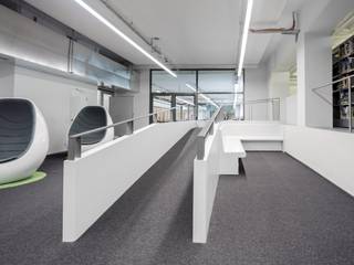 KRION at the nerve centre of the Technical University of Munich (TUM): its library, KRION® Porcelanosa Solid Surface KRION® Porcelanosa Solid Surface Ruang Media Modern