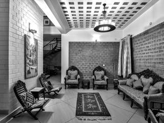 Col Prabhakar's house, Myriadhues Myriadhues Livings de estilo